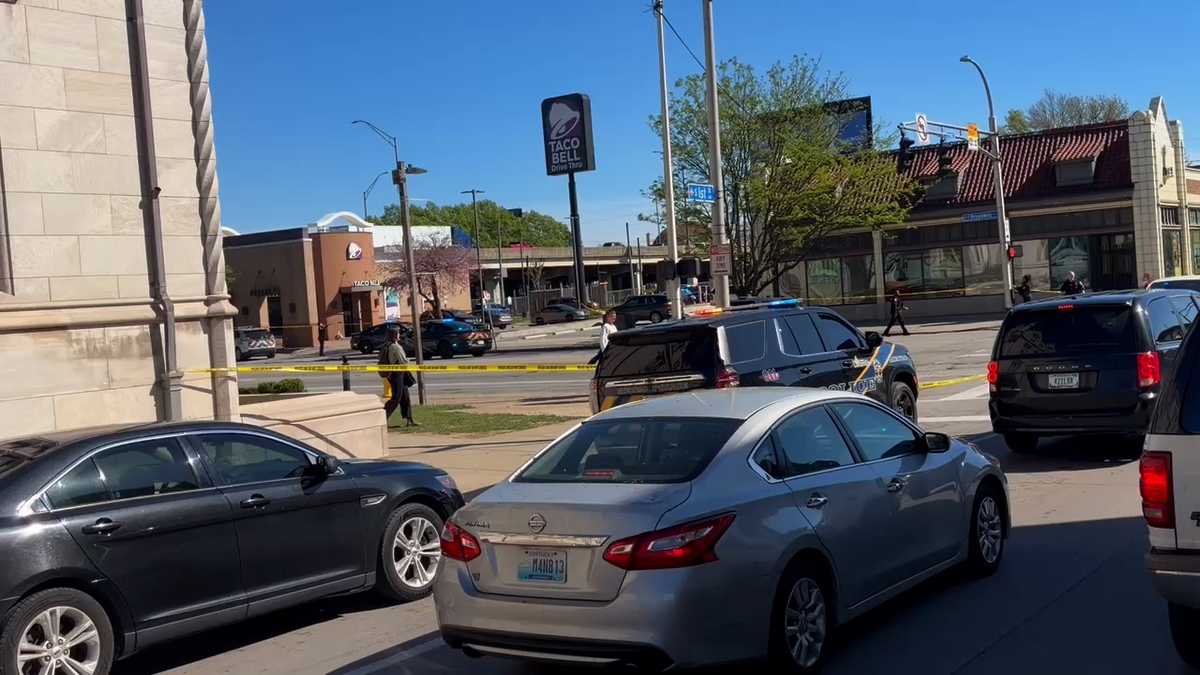 Police involved in downtown Louisville shooting; car riddled with bullet holes