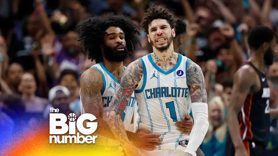 Charlotte Hornets guard LaMelo Ball (1) celebrates with guard Coby White after scoring against the Miami Heat during the second half of an NBA play-in tournament basketball game in Charlotte, N.C., Tuesday, April 14, 2026. (AP Photo/Nell Redmond)
