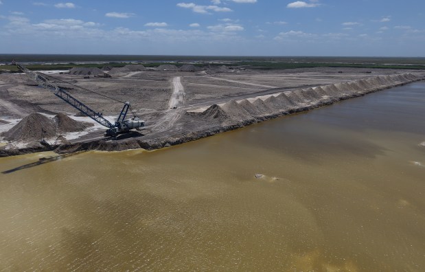 A massive dragline excavator, one of only three of its size in existence, digs at the Everglades Agricultural Area (EAA) A-2 Reservoir restoration project in South Bay on Monday, April 13, 2026. (Joe Cavaretta/South Florida Sun Sentinel)