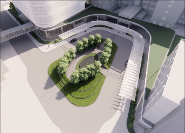An aerial rendering shows how the main entrance to Hartford Hospital will be redesigned with an above ground concourse connecting all the buildings, including the new, 14-story tower, at left. A skywalk will connect a new arrival center with the tower and a new, "healing garden" would round out the redesign. (Hartford HealthCare)