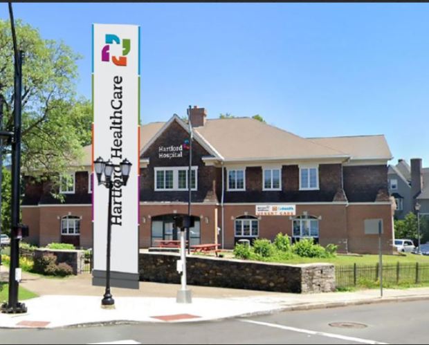 A rendering shows how the former Girl Scouts of Connecticut headquarters on the corner of Washington Street and Retreat Avenue on the Hartford Hospital campus will be transformed into an expanded version of Hartford HealthCare-Go Health urgent care clinic. (Hartford HealthCare)