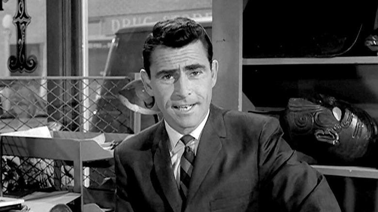 Rod Serling speaking to the camera in an office in The Twilight Zone.