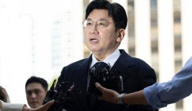 South Korean police seek to arrest K-pop mogul behind BTS