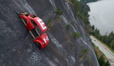 Car shell suspended on rock face above British Columbia highway in apparent prank