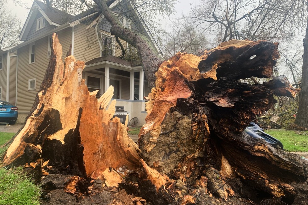 Floodwaters inundate Wisconsin streets as other Midwestern states rebuild after storms