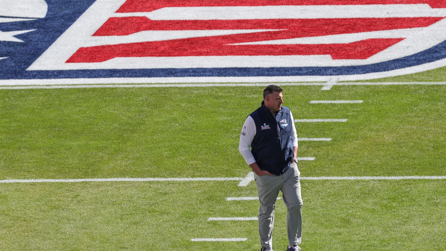 After missing third day of draft, Mike Vrabel is back with the Patriots