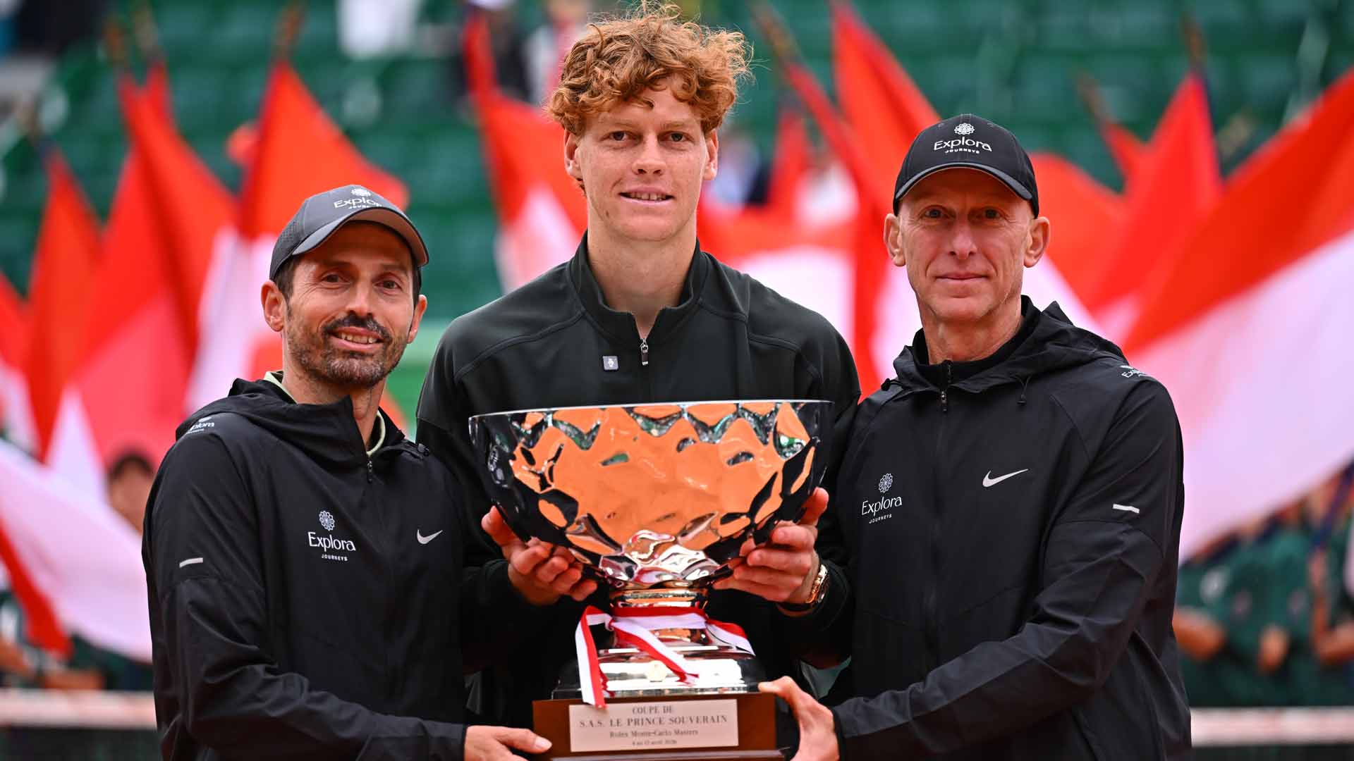 Simone Vagnozzi, Jannik Sinner and Umberto Ferrara celebrate Sinner's Monte-Carlo triumph.