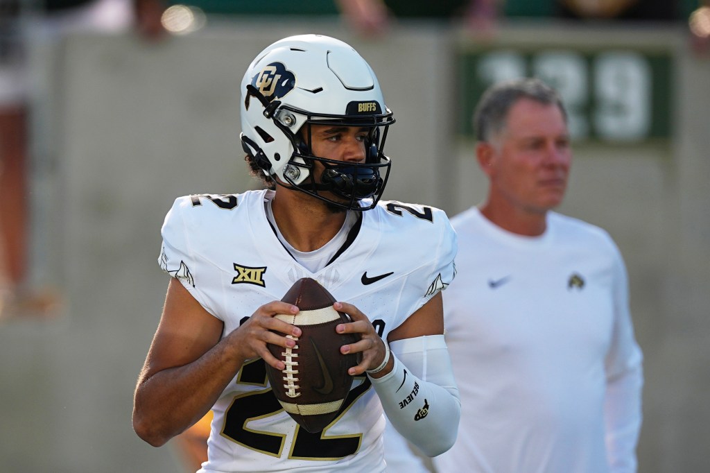 Colorado quarterback Dominiq Ponder (22) warms up before an NCAA college football game.