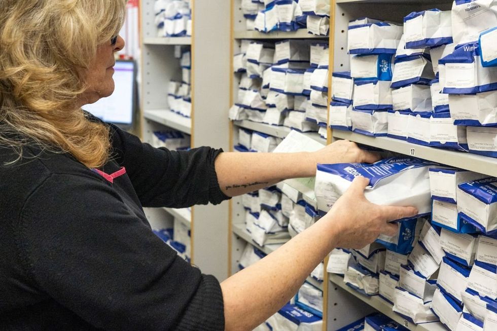 WOMAN AT PHARMACY