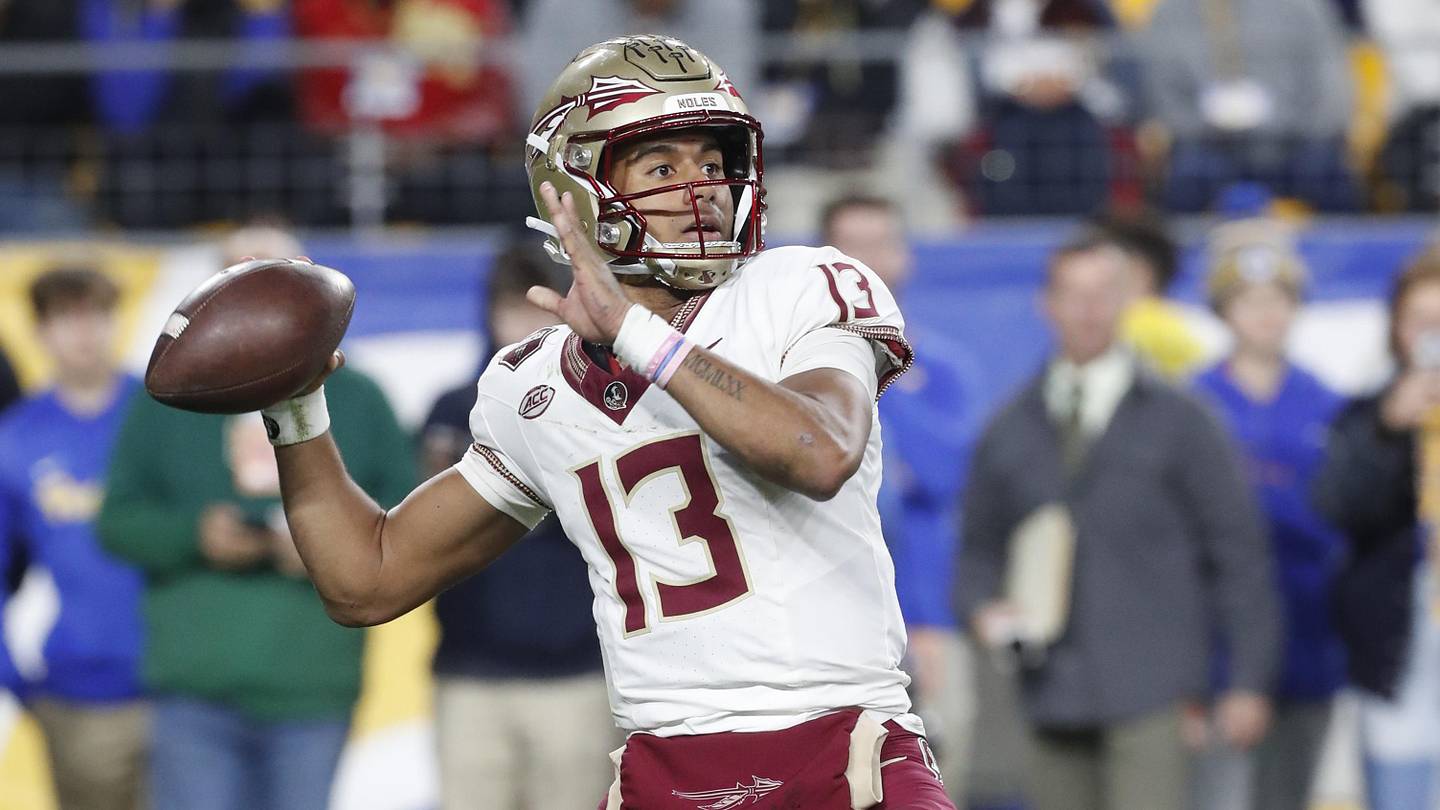 Nov 4, 2023; Pittsburgh, Pennsylvania, USA;  Florida State Seminoles quarterback Jordan Travis (13) passes the ball against the Pittsburgh Panthers during the third quarter at Acrisure Stadium. The Seminoles won 24-7. Mandatory Credit: Charles LeClaire-Imagn Images