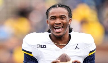 Michigan quarterback Bryce Underwood (19) shares a laughter with running back Jordan Marshall (23), left, during the spring game at Michigan Stadium in Ann Arbor on Saturday, April 18, 2026.