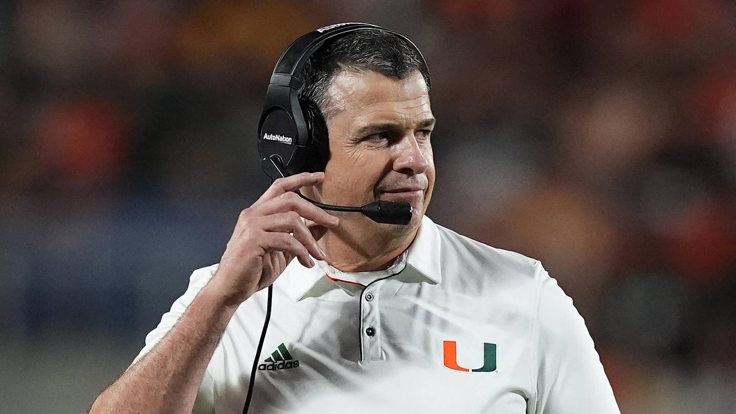 Dec 28, 2024; Orlando, FL, USA; Miami Hurricanes head coach Mario Cristobal walks on the field during the second half against the Iowa State Cyclones at Camping World Stadium. Mandatory Credit: Jasen Vinlove-Imagn Images