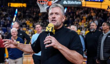Michigan football head coach Kyle Whittingham speaks as he is being introduced on the floor during the first half between Michigan and USC at Crisler Center in Ann Arbor on Friday, Jan. 2, 2026.