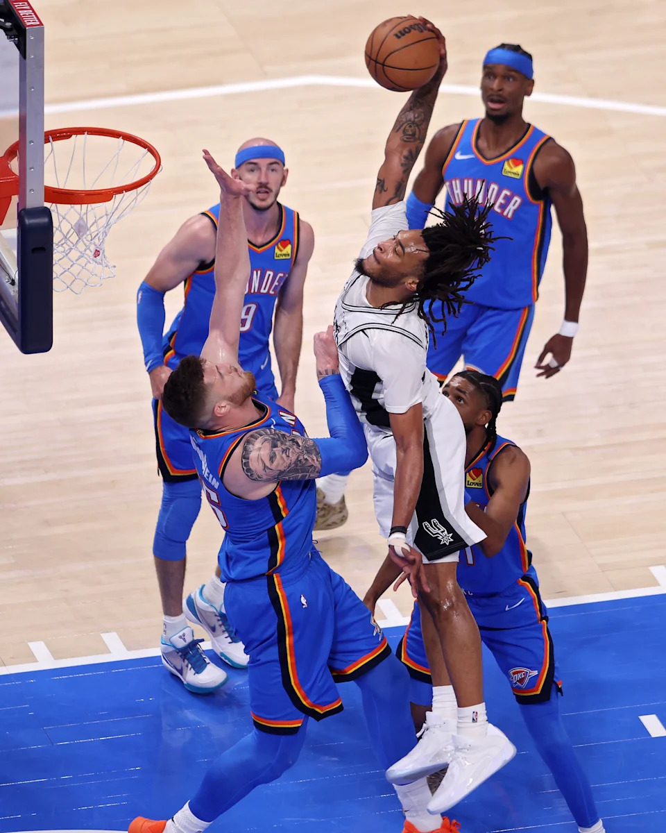 OKLAHOMA CITY, OKLAHOMA - MAY 20: Stephon Castle #5 of the San Antonio Spurs drives to the rim over Isaiah Hartenstein #55 of the Oklahoma City Thunder during the second quarter in Game Two of the NBA Western Conference Finals at Paycom Center on May 20, 2026 in Oklahoma City, Oklahoma. NOTE TO USER: User expressly acknowledges and agrees that, by downloading and or using this photograph, User is consenting to the terms and conditions of the Getty Images License Agreement. (Photo by William Purnell/Getty Images)