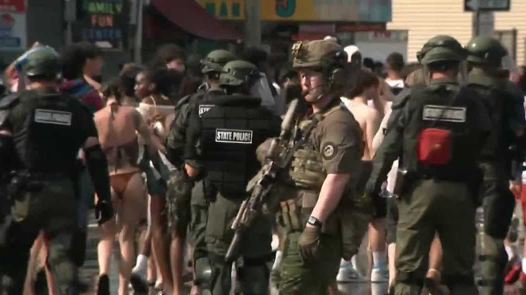 Police in tactical gear clear Ocean Boulevard in Hampton