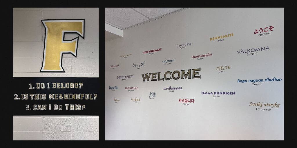 A sign with Jordan Halverson's three core pillars, and a photo welcoming visitors to Fridley Middle School in different lanugages.