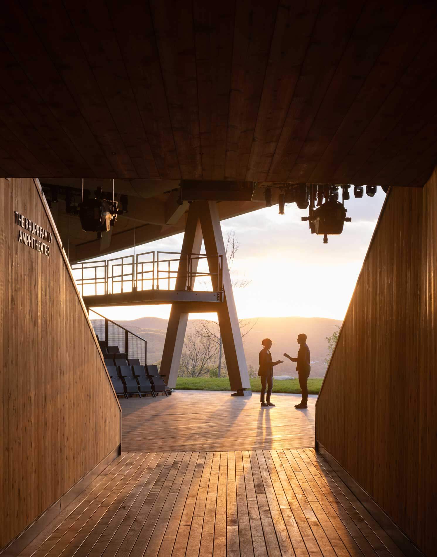 Large A-shaped timber columns support theater structure for hudson valley shakespere