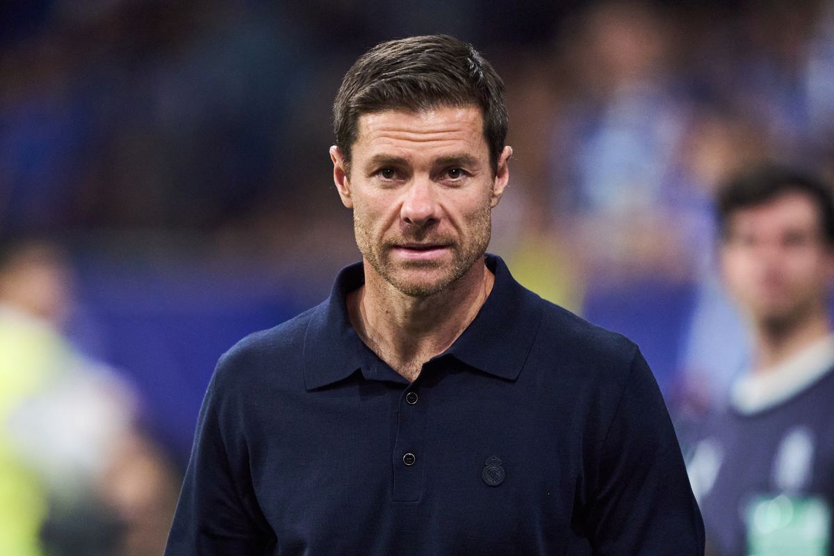 Xabi Alonso looks on