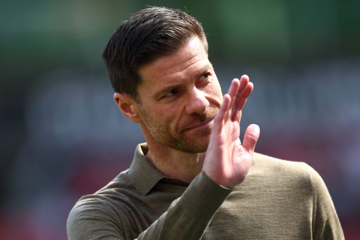 LEVERKUSEN, GERMANY - APRIL 26: Xabi Alonso, Head Coach of Bayer 04 Leverkusen, waves prior to the Bundesliga match between Bayer 04 Leverkusen and FC Augsburg at BayArena on April 26, 2025 in Leverkusen, Germany. (Photo by Lars Baron/Getty Images)