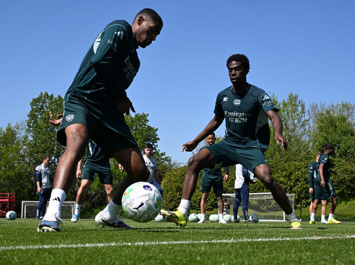 Cristhian Mosquera and Josh Ogunnaike of Arsenal during a training sesssion at Sobha Realty Training Centre on May 01, 2026 in London Colney, England.