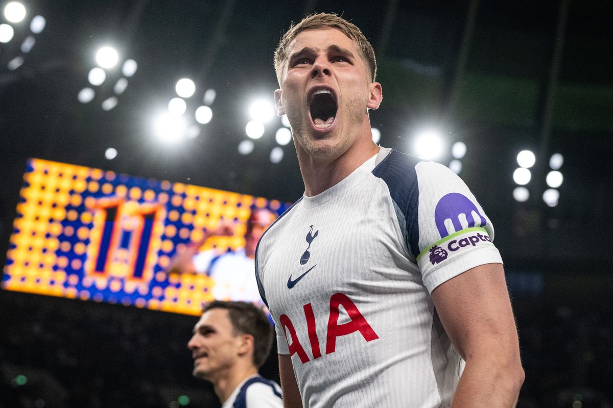 Micky van de Ven celebrates Mathys Tel during the Premier League match between Tottenham Hotspur and Leeds United