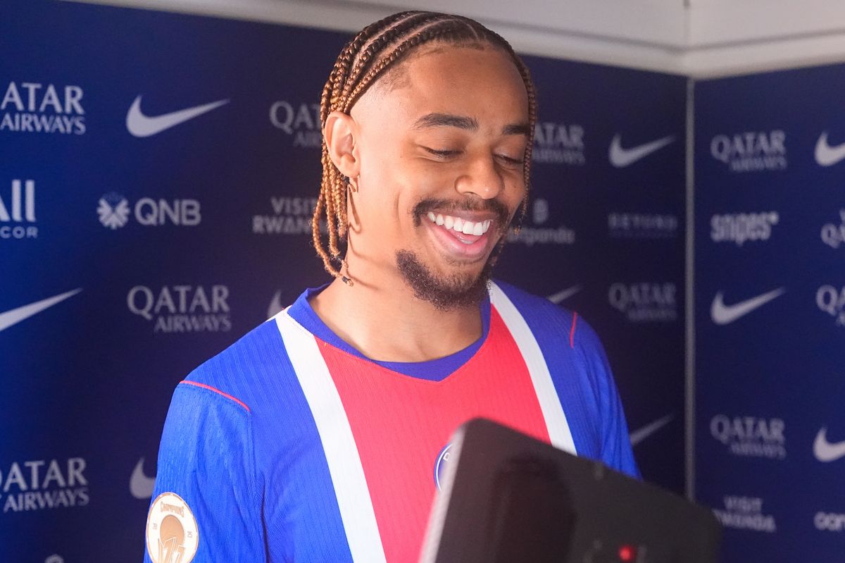 Bradley Barcola #29 of Paris Saint-Germain F.C. is all smiles after receiving a FIFA FC 2026 award after the Ligue 1 McDonald's regular season match between the Paris Saint Germain (PSG) and the Brest on May 10, 2026 in Parc des Princes, France.