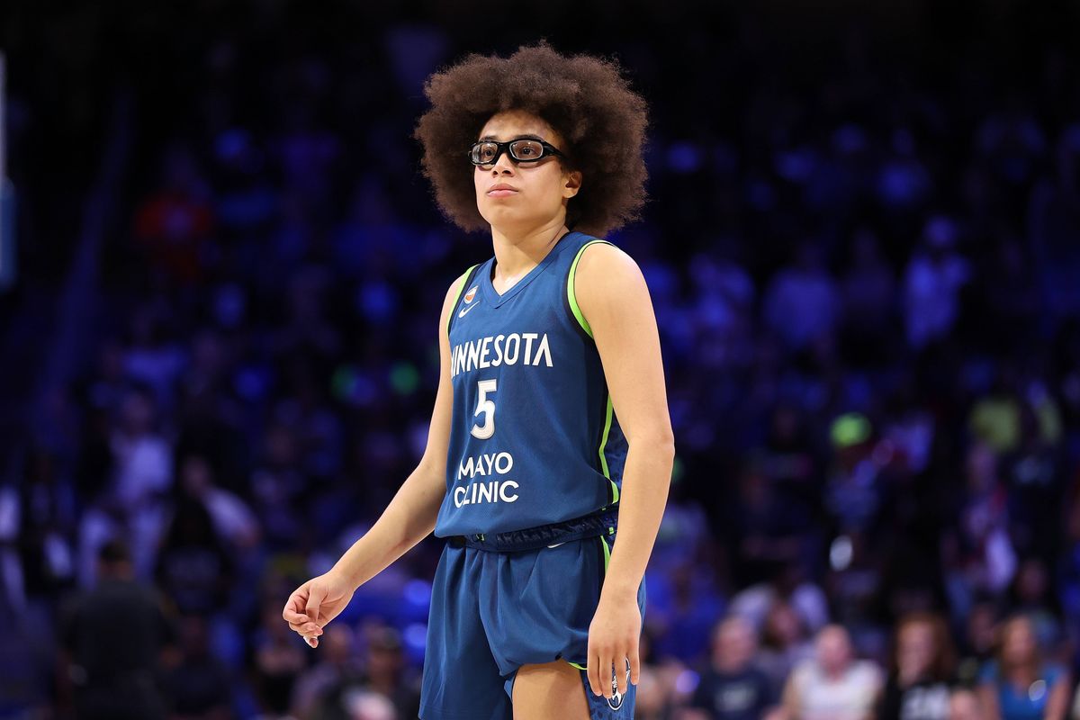 Olivia Miles of the Minnesota Lynx stands on the court