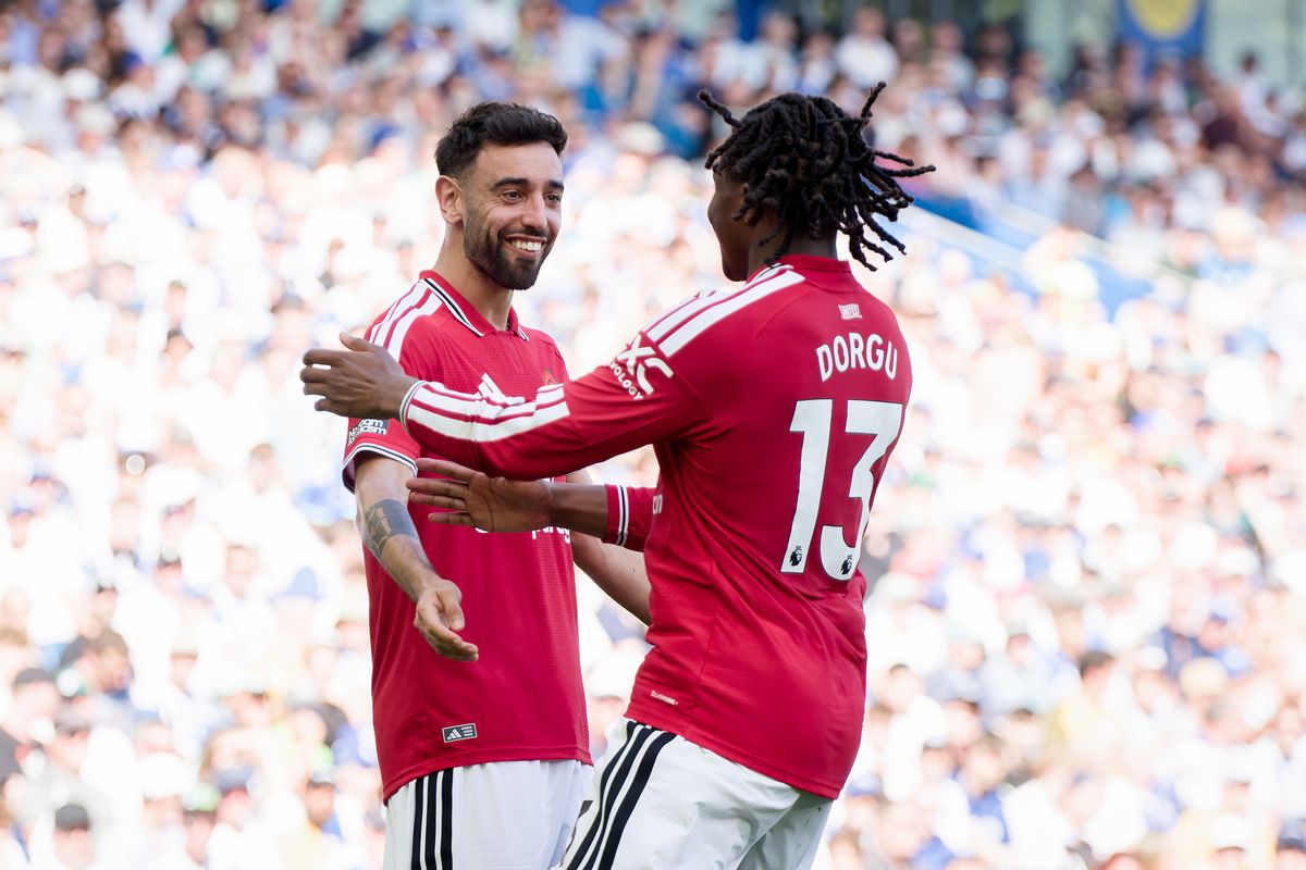 Patrick Dorgu of Manchester United celebrates his goal with Bruno Fernandes of Manchester United during the Premier League match between Brighton & Hove Albion and Manchester United at Amex Stadium on May 24, 2026 in Brighton, England.