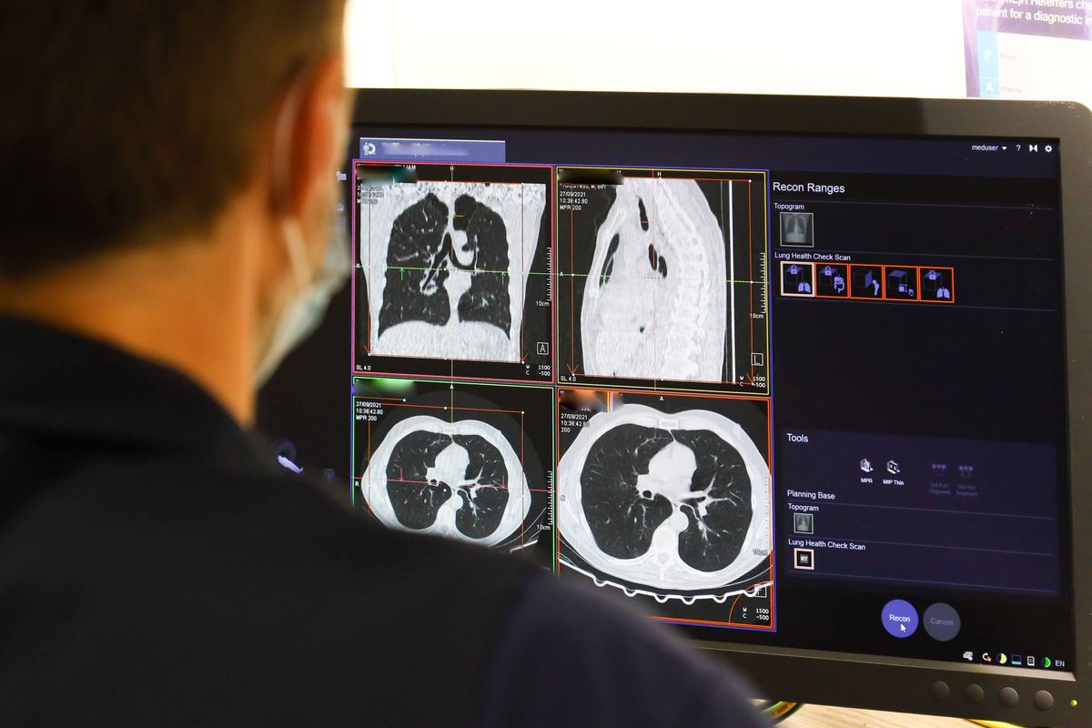 CT scan being examined