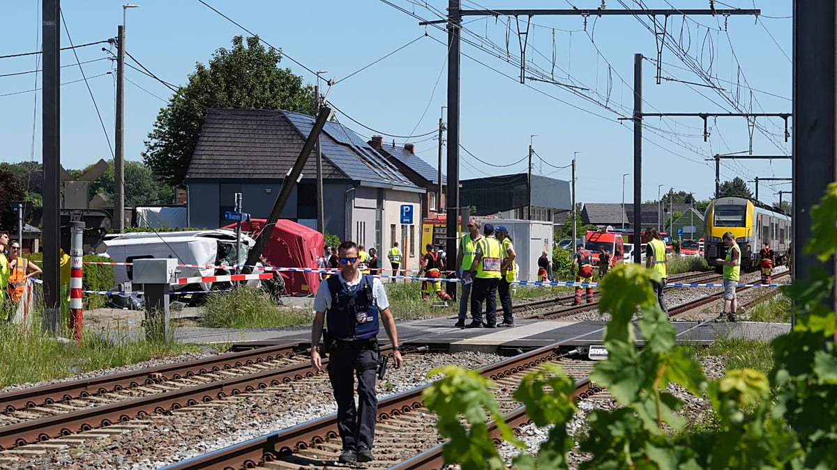 Four dead and two injured after train hits school bus in Belgium, deputy PM says