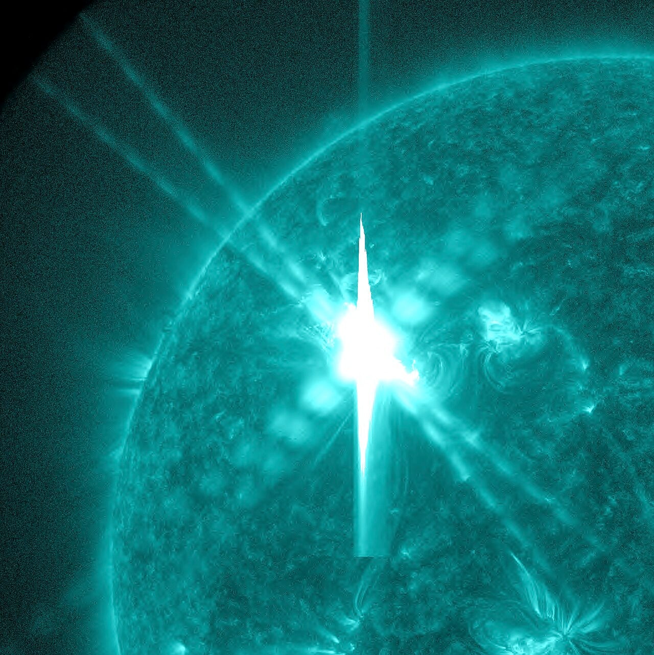 Image artefacts (diffraction spikes and vertical streaks) appearing in a CCD image of a major solar flare due to the excess incident radiation (Credit : NASA Goddard Space Flight Centre)
