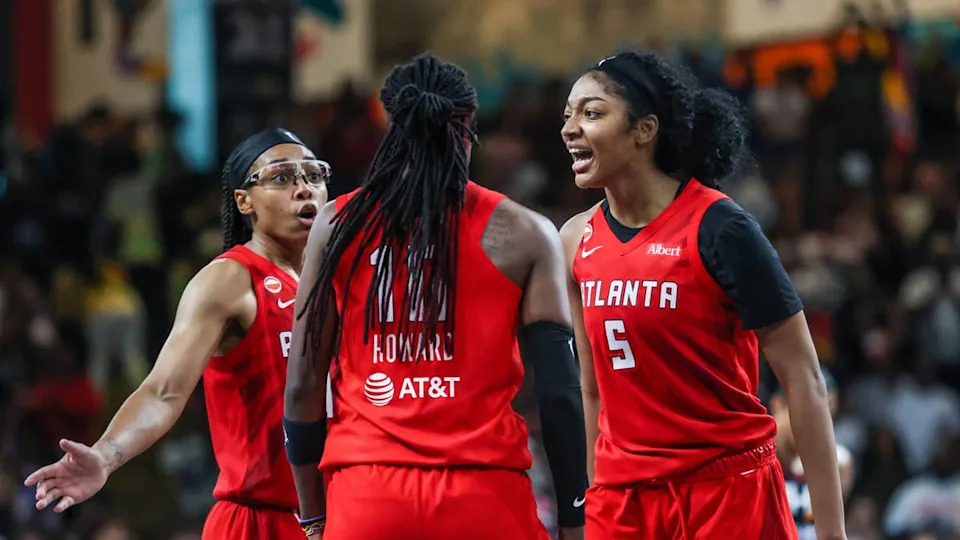 Atlanta Dream's <a class="link " href="https://sports.yahoo.com/wnba/players/5792/" data-i13n="sec:content-canvas;subsec:anchor_text;elm:context_link" data-ylk="slk:Allisha Gray;sec:content-canvas;subsec:anchor_text;elm:context_link;itc:0" data-yga="{"yLinkElement":"context_link","yModuleName":"content-canvas","yLinkText":"Allisha Gray","ySubModuleName":"anchor_text","yHasCommerce":false}">Allisha Gray</a>, Rhyne Howard and Angel Reese talk during deadball vs the Phoenix MercuryJordan Godfree-Imagn Images