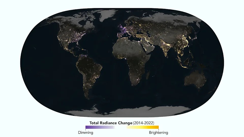 an image of a dark nighttime earth flattened into an ovoid, with populated regions lit up from blue to orange according to how much their lights changed from 2014 to 2022