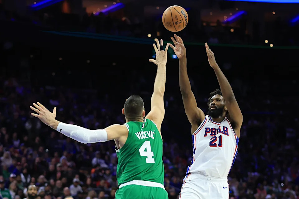 Joel Embiid of the Philadelphia 76ers shoots the ball as Nikola Vucevic of the Boston Celtics defends during the second quarter in Game 6 of the first round of the NBA playoffs at Xfinity Mobile Arena in Philadelphia, Pennsylvania on April 30, 2026.