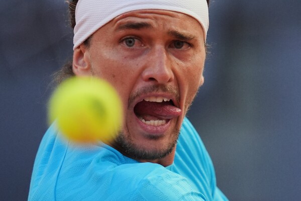 Alexander Zverev of Germany eyes the ball during his match against Terence Atmane of France during the Madrid Open tennis tournament in Madrid, Monday, April 27, 2026. (AP Photo/Manu Fernandez, File)