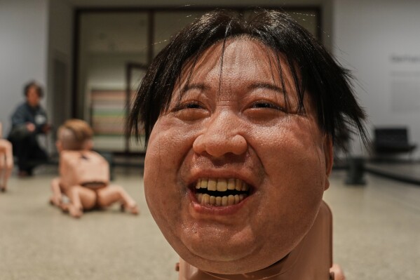 A Robot in the likeness of Kim Jong Un displayed at the installation titled Regular Animals by artist Beeple, Mike Winkelmann, at the Neue Nationalgalerie museum in Berlin, Germany, Tuesday, April 28, 2026. (AP Photo/Markus Schreiber, File)