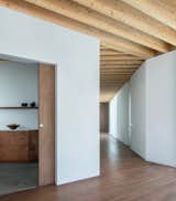 Wood Prefab Panels Cloaked in Galvanized Steel Form a Hillside Home in Barcelona - Photo 7 of 14 -