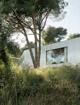 Wood Prefab Panels Cloaked in Galvanized Steel Form a Hillside Home in Barcelona - Photo 13 of 14 -