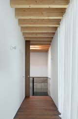 Wood Prefab Panels Cloaked in Galvanized Steel Form a Hillside Home in Barcelona - Photo 12 of 14 -