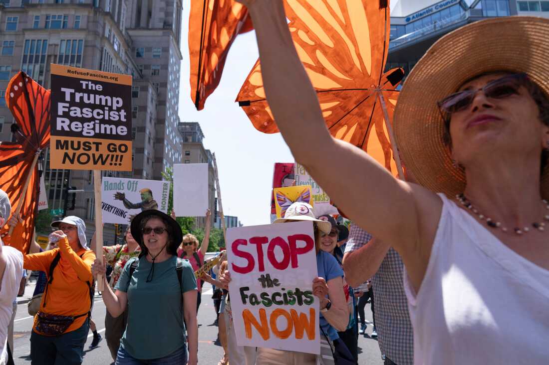 Demonstrators march to the White House during a May Day protest in Washington, D.C., on May 1, 2025.