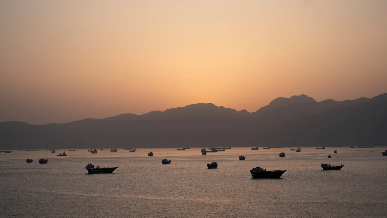 Ships and boats in the Strait of Hormuz seen from Musandam, Oman, on May 1, 2026.