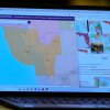 A senator's laptop displays a congressional redistricting plan during debate before its passage in the Florida Senate.
