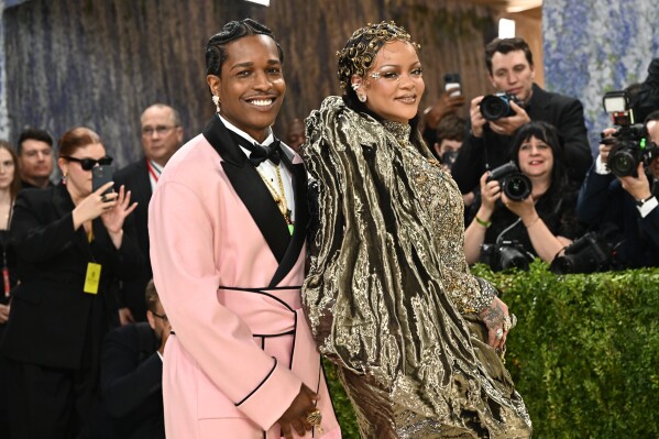 A$AP Rocky, left, and Rihanna arrive at The Metropolitan Museum of Art's Costume Institute benefit gala celebrating the opening of the "Costume Art" exhibition on Monday, May 4, 2026, in New York. (Photo by Evan Agostini/Invision/AP)