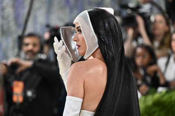 Katy Perry arrives at The Metropolitan Museum of Art's Costume Institute benefit gala celebrating the opening of the "Costume Art" exhibition on Monday, May 4, 2026, in New York. (Photo by Evan Agostini/Invision/AP)