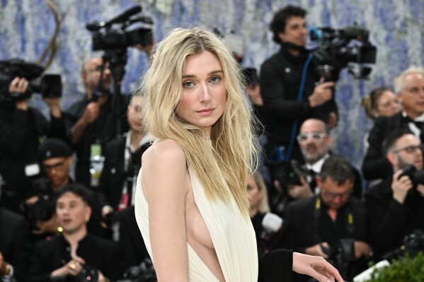 Elizabeth Debicki arrives at The Metropolitan Museum of Art's Costume Institute benefit gala celebrating the opening of the "Costume Art" exhibition on Monday, May 4, 2026, in New York. (Photo by Evan Agostini/Invision/AP)
