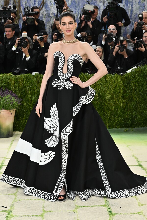 Anne Hathaway arrives at The Metropolitan Museum of Art's Costume Institute benefit gala celebrating the opening of the "Costume Art" exhibition on Monday, May 4, 2026, in New York. (Photo by Evan Agostini/Invision/AP)