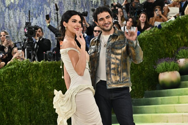 Kendall Jenner, left, and Zac Posen arrive at The Metropolitan Museum of Art's Costume Institute benefit gala celebrating the opening of the "Costume Art" exhibition on Monday, May 4, 2026, in New York. (Photo by Evan Agostini/Invision/AP)