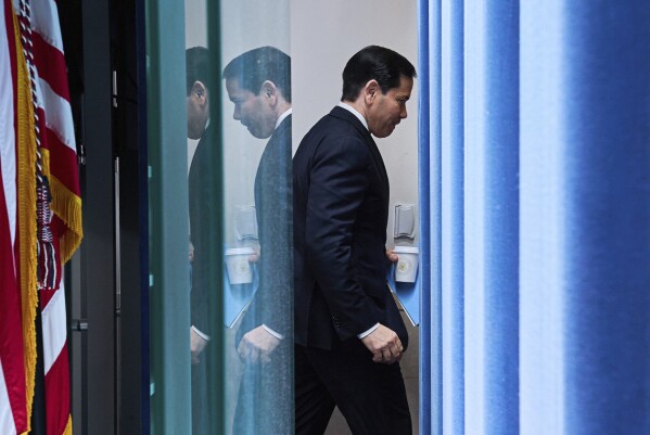 Secretary of State Marco Rubio leaves the room after speaking to the media in the James Brady Press Briefing Room of the White House, Tuesday, May 5, 2026, in Washington. (AP Photo/Jacquelyn Martin)