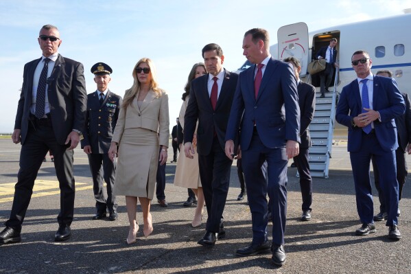 US Secretary of State Marco Rubio meets U.S. Ambassador to the Holy See Brian Burch upon hi arrival at Rome's Ciampino airport for a two-day visit to Italy and the Vatican, Thursday, May 7, 2026. (AP Photo/Andrew Medichini, Pool)