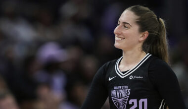 Golden State Valkyries guard Kate Martin smiles as she walks to the sideline during the second half of a WNBA basketball game against the Indiana Fever, Sunday, Aug. 31, 2025, in San Francisco. 